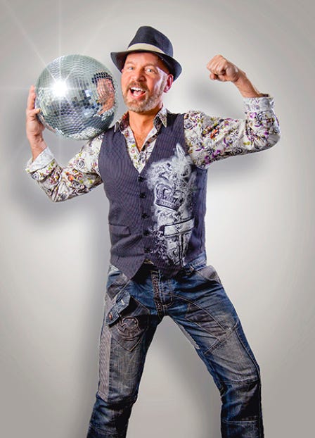 A picture of Disco Vinnie holding a disco ball